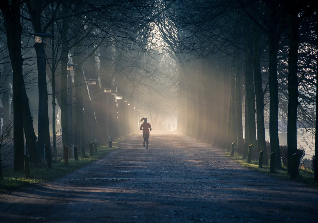 a person going for an early morning run