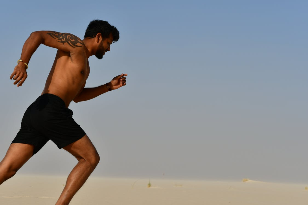  a man running after calisthenics strength training
